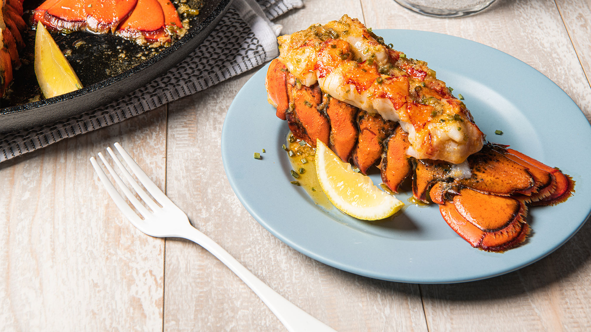 baked_lobster_tails_with_lemon_herb_butter2000x1125.jpg