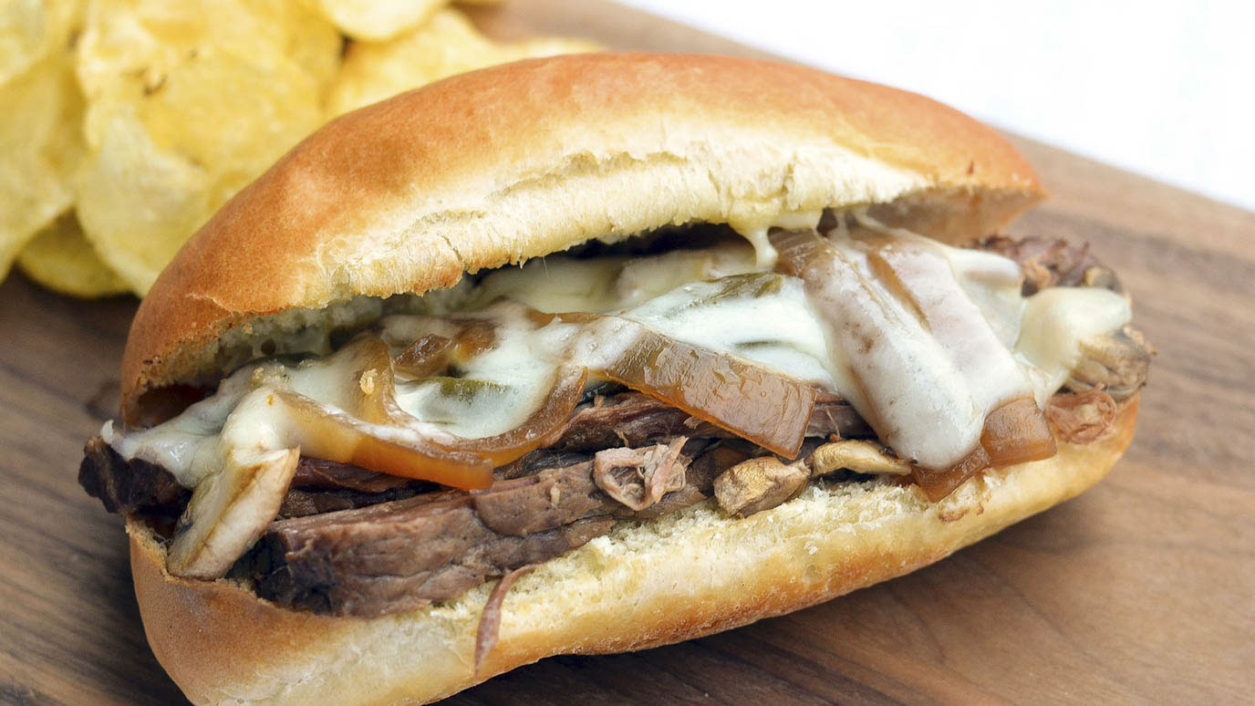 slow_cookers_philly_cheese_steak_sandwiches_2000x1125.jpg