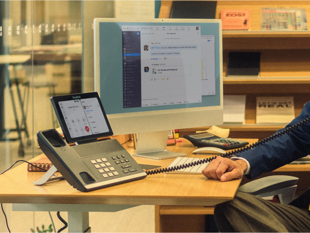 Haas Person sitting at a desk
